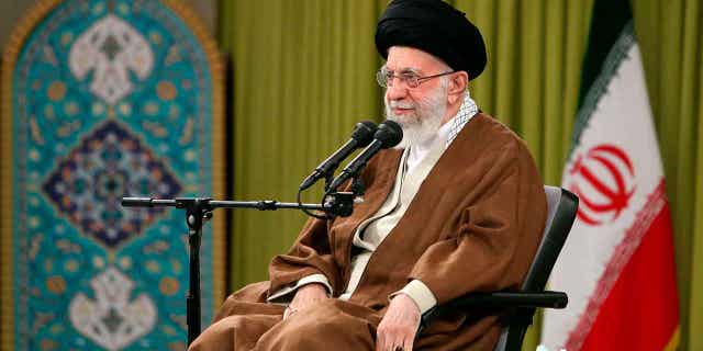 Supreme Leader Ayatollah Ali Khamenei speaks during a meeting in Tehran, Iran, on Nov. 26, 2022. The niece of Khamenei is calling on citizens to pressure the government to cut ties with Tehran.