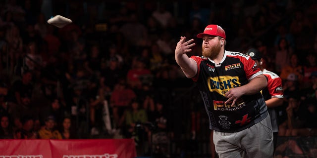 Jamie Graham tosses a bag during his semi-final match with Mark Richards during the American Cornhole League Pro Singles World Championship finals at the Rock Hill Sports and Event Center in Rock Hill, South Carolina, Aug. 6, 2022. Graham, who was ranked third going into the competition would not move on past the semi-finals after being beaten by Richards.