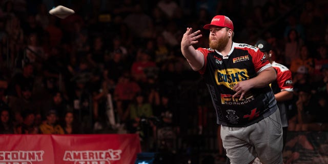 Jamie Graham tosses a bag during his semi-final match with Mark Richards during the American Cornhole League Pro Singles World Championship finals at the Rock Hill Sports and Event Center in Rock Hill, South Carolina, Aug. 6, 2022. Graham, who was ranked third going into the competition would not move on past the semi-finals after being beaten by Richards.