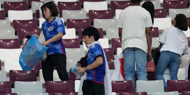 2022 fifa world cup Japan supporters have gone viral for cleaning up the trash after their team's match in Doha, Qatar, Wednesday, Nov. 23, 2022. Japan won 2-1.