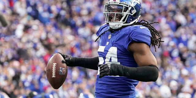 New York Giants linebacker Jaylon Smith, #54, reacts after a defensive play against the Houston Texans during the fourth quarter of an NFL football game, Sunday, Nov.  13, 2022, in East Rutherford, New Jersey.