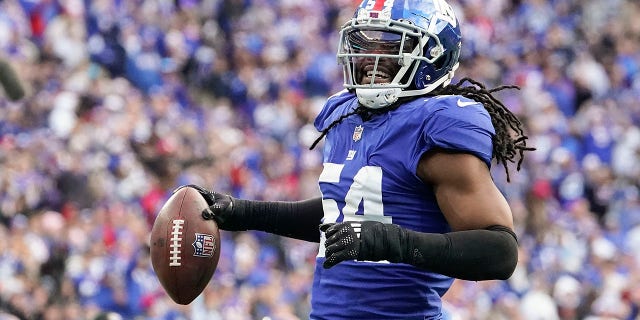 New York Giants linebacker Jaylon Smith, #54, reacts after a defensive play against the Houston Texans during the fourth quarter of an NFL football game, Sunday, Nov. 13, 2022, in East Rutherford, New Jersey.