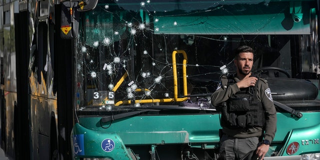 Israeli police inspect the scene of an explosion at a bus stop in Jerusalem, Wednesday, November 23, 2022. 