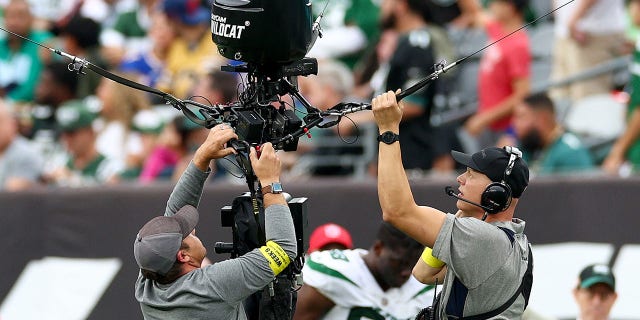 Jets brush off camera delay in upset win over Bills: 'Definitely like a conspiracy theory' 1 Crews work to repair a Skycam during the second half of a game between the New York Jets and Buffalo Bills at MetLife Stadium on Nov. 6, 2022 in East Rutherford, New Jersey.
