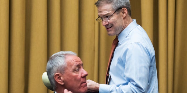 Ranking member Rep. Jim Jordan, R-Ohio, right, and Rep. Ken Buck, R-Colo., are seen during the House Judiciary Committee hearing titled "Oversight of the Federal Bureau of Investigation, Cyber Division," in Washington, D.C., on March 29, 2022.