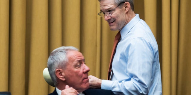 Ranking member Rep. Jim Jordan, R-Ohio, right, and Rep. Ken Buck, R-Colo., are seen during the House Judiciary Committee hearing titled "Oversight of the Federal Bureau of Investigation, Cyber Division," in Washington, D.C., on March 29, 2022.