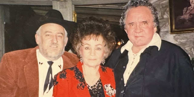 Joanne Cash said she and her brother Johnny Cash, right, faced their personal struggles, but found salvation in Christ.