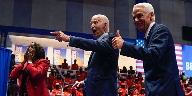 President Biden is joined on stage by Florida gubernatorial candidate Charlie Crist and Senate candidate Rep. Val Demings during a campaign rally at Florida Memorial University, Tuesday, Nov. 1, 2022, in Miami Gardens.