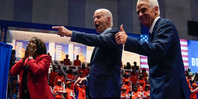 President Biden is joined on stage by Florida gubernatorial candidate Charlie Crist and Senate candidate Rep. Val Demings during a campaign rally at Florida Memorial University, Tuesday, Nov. 1, 2022, in Miami Gardens.