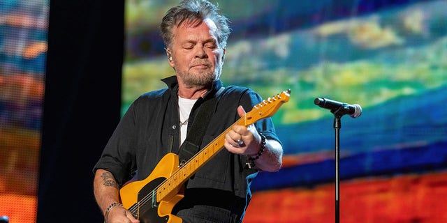 John Mellencamp performs during the Farm Aid Music Festival at the Coastal Credit Union Music Park on Sept. 24, 2022, in Raleigh, North Carolina. 