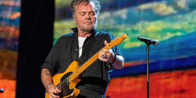 John Mellencamp performs during the Farm Aid Music Festival at the Coastal Credit Union Music Park on Sept. 24, 2022, in Raleigh, North Carolina. 