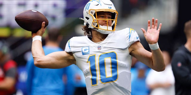 NFL Week 10 Preview: Bucs take on Seahawks in Germany; Mike McCarthy returns to Lambeau 5 Los Angeles Chargers quarterback Justin Herbert warms up before a game against the Atlanta Falcons, Sunday, Nov. 6, 2022, in Atlanta.
