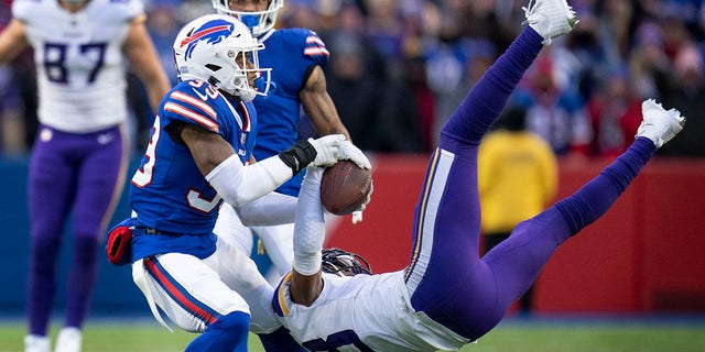 Minnesota Vikings wide receiver Justin Jefferson, #18, catches a deep pass in overtime of an NFL football game against Buffalo Bills cornerback Cam Lewis, #39, in Orchard Park. New York, Sunday, Nov. 13, 2022.