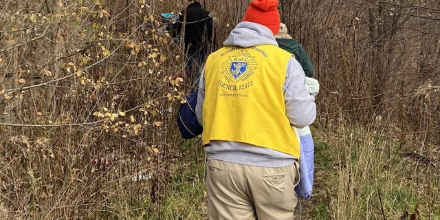 The Scranton council of the Knights of Columbus walks public trails handing out coats to homeless youth