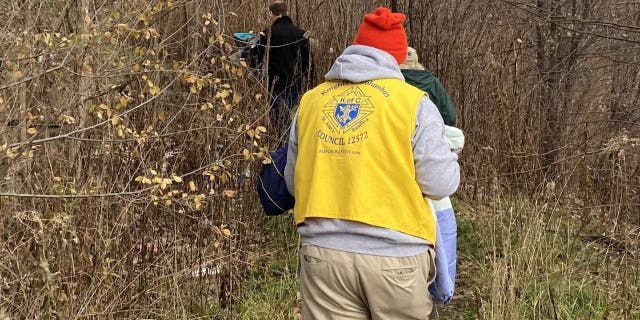 The Scranton council of the Knights of Columbus walks public trails handing out coats to homeless youth