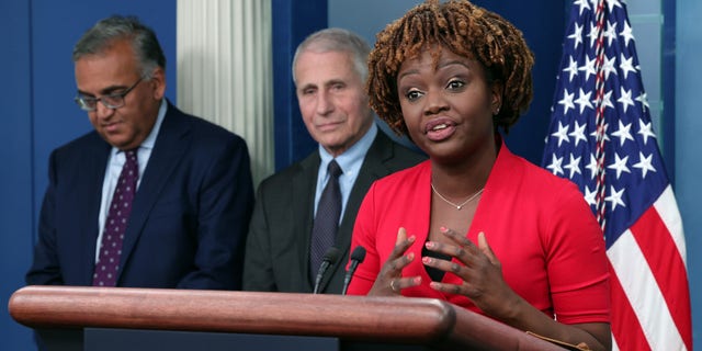 White House press secretary Karine Jean-Pierre speaks alongside White House chief medical adviser Dr. Anthony Fauci, center, and COVID-19 Response Coordinator Dr. Ashish Jha during a briefing on COVID-19 at the White House on Nov. 22, 2022.