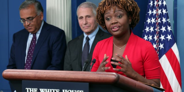 White House press secretary Karine Jean-Pierre speaks alongside White House chief medical adviser Dr. Anthony Fauci, center, and COVID-19 Response Coordinator Dr. Ashish Jha during a briefing on COVID-19 at the White House on Nov. 22, 2022.