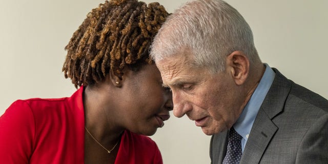 Dr. Anthony Fauci, director of the National Institute of Allergy and Infectious Diseases, right, and Karine Jean-Pierre, White House press secretary, speak during a news conference at the White House on Nov. 22, 2022.