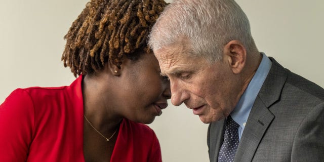 Dr. Anthony Fauci, director of the National Institute of Allergy and Infectious Diseases, right, and Karine Jean-Pierre, White House press secretary, speak during a news conference at the White House on Nov. 22, 2022.