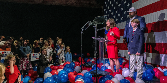 Newly elected Republican Alabama Sen. Katie Britt, joined by her family onstage, speaks to supporters at her election night watch party