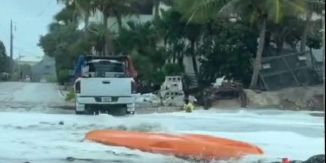 A kayak floats in the streets on Florida's Hutchinson Island ahead of Hurricane Nicole