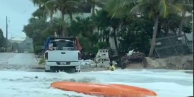 A kayak floats in the streets on Florida's Hutchinson Island ahead of Hurricane Nicole