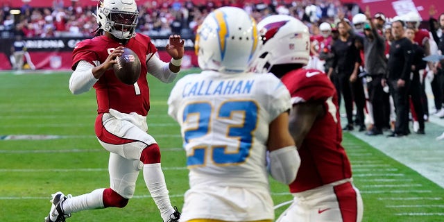 Arizona Cardinals quarterback Kyler Murray (1) fights for a touchdown against the Los Angeles Chargers on November 27, 2022, in Glendale, Arizona.