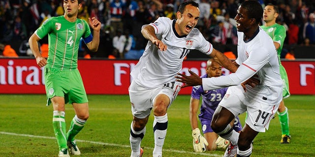 Landon Donovan of the United States celebrates scoring the game-winning goal that sends the US into the second round during the Group C match of the 2010 FIFA World Cup South Africa.