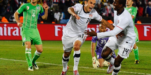 Landon Donovan of the United States celebrates scoring the game-winning goal that sends the US into the second round during the Group C match of the 2010 FIFA World Cup South Africa.