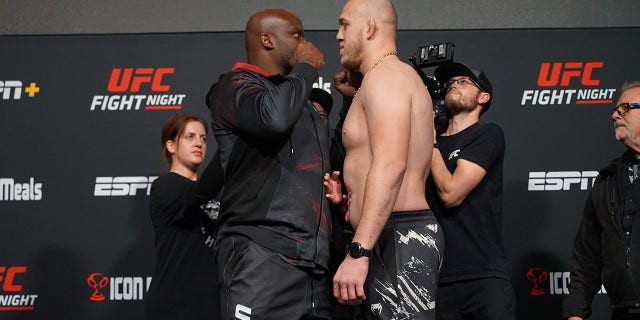 Derrick Lewis, left, and Serghei Spivac face off for the first time ahead of their UFC Vegas 62 bout Nov. 18, 2022, at the UFC APEX in Las Vegas.