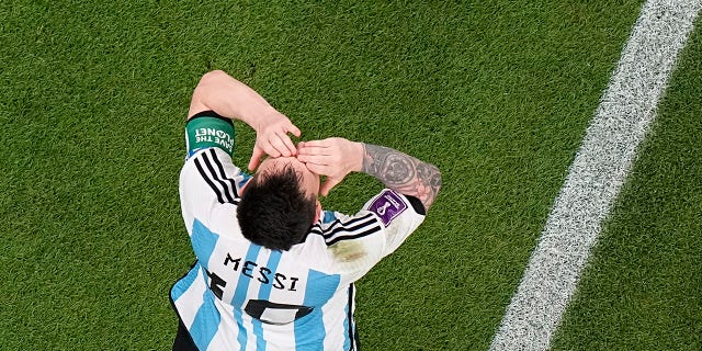 Argentina's Lionel Messi celebrates after scoring his side's opening goal during the World Cup group C soccer match between Argentina and Mexico, at the Lusail Stadium in Lusail, Qatar, Saturday, Nov. 26, 2022. 