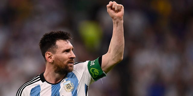 Argentina's Lionel Messi celebrates after scoring his side's opening goal during the World Cup group C soccer match between Argentina and Mexico, at the Lusail Stadium in Lusail, Qatar, Saturday, Nov. 26, 2022.