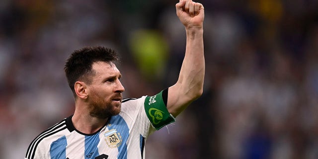 Argentina's Lionel Messi celebrates after scoring his side's opening goal during the World Cup group C soccer match between Argentina and Mexico, at the Lusail Stadium in Lusail, Qatar, Saturday, Nov. 26, 2022.