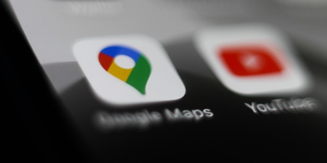 The Google Maps logo is seen on a smartphone in this photo illustration taken in Krakow, Poland, on March 10, 2020. 