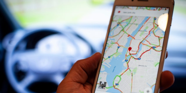 A mobile phone with the Google Maps application is seen in this photo illustration on September 18, 2018.