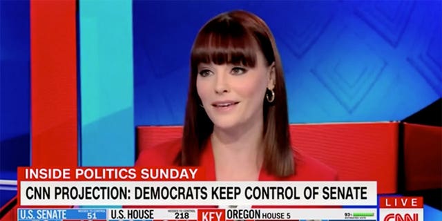 CNN reporter Melanie Zanona said Sunday that Democrats won "in spite of" President Biden. 