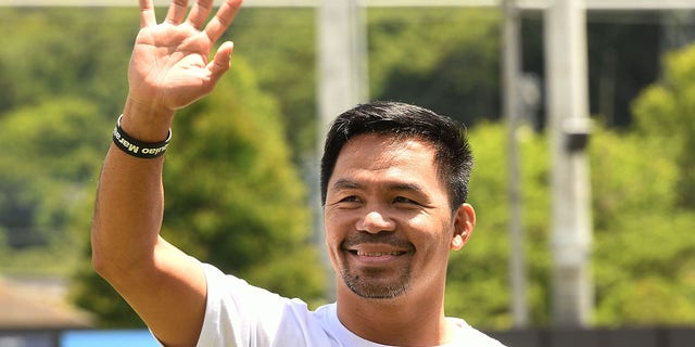 Manny Pacquiao attends the charity marathon event to provide shelters for the children in the Philippines at City Football Station on May 22, 2022 in Tochigi, Japan.