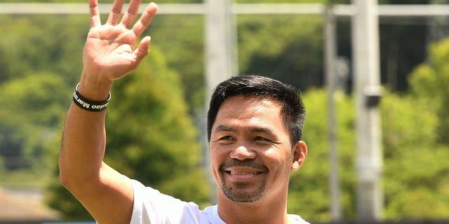 Manny Pacquiao attends the charity marathon event to provide shelters for the children in the Philippines at City Football Station on May 22, 2022 in Tochigi, Japan.