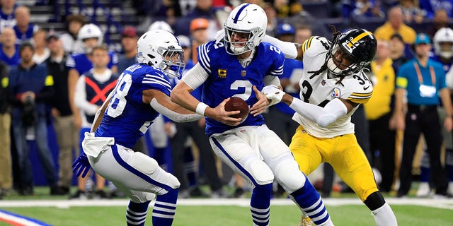 Pittsburgh Steelers' Terrell Edmunds (34) sacks Indianapolis Colts' Matt Ryan (2) during the first quarter in a game at Lucas Oil Stadium on November 28, 2022 in Indianapolis.