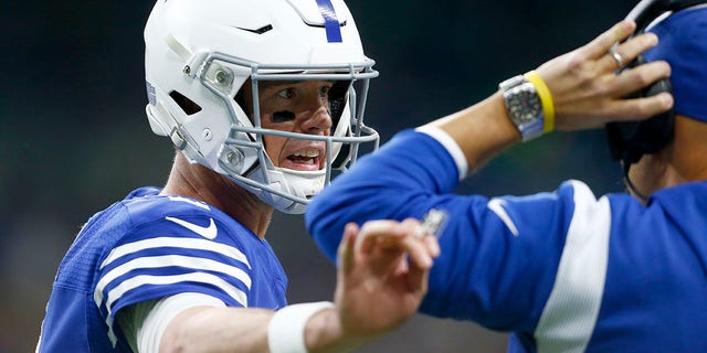 Indianapolis Colts quarterback Matt Ryan (2) talks on the sidelines during a timeout during an NFL game between the Pittsburg Steelers and the Indianapolis Colts on November 28, 2022 at Lucas Oil Stadium in Indianapolis, IN.
