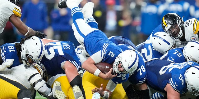 Indianapolis Colts quarterback Matt Ryan, #2, dives for a first down during the second half of an NFL football game against the Pittsburgh Steelers, Monday, Nov. 28, 2022, in Indianapolis.