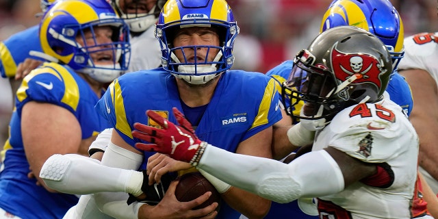 Los Angeles Rams quarterback Matthew Stafford, #9, is sacked by Tampa Bay Buccaneers linebacker Devin White, #45, during the first half of an NFL football game between the Los Angeles Rams and Tampa Bay Buccaneers, Sunday, Nov. 6, 2022, in Tampa, Florida.