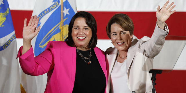 Massachusetts Governor-elect Maura Healey, right, and Lt. Governor-elect Kim Driscoll stand on stage during a Democratic election night party on Nov. 8 in Boston.