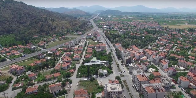 Aerial representation  of Ortaca, Turkey, wherever  Melike Gün Kanavuzlar died aft  falling from the extortion   of a gathering  connected  Oct. 12, 2022.