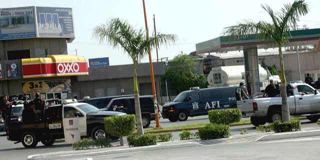 The AFI, the Mexican law enforcement equivalent of the FBI, on patrol in Nuevo Laredo, Mexico, on Aug. 1, 2005. 