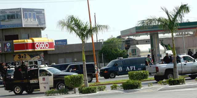 The AFI, the Mexican law enforcement equivalent of the FBI, on patrol in Nuevo Laredo, Mexico, on Aug. 1, 2005.