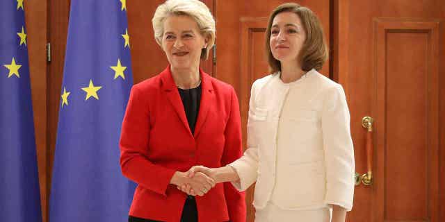 European Commission President Ursula von der Leyen, left, shakes hands with Moldovan President Maia Sandu after a joint news conference in Chisinau, Moldova November 10, 2022.