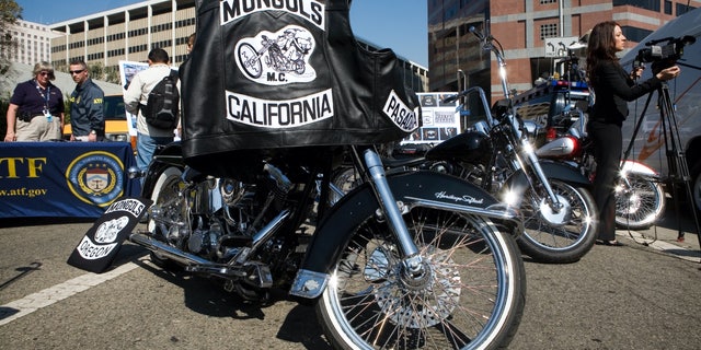 Motorcycles seized from the Mongols Motorcycle gang is on display during a press conference in Los Angeles.