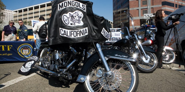 Motorcycles seized from the Mongols Motorcycle gang is on display during a press conference in Los Angeles.