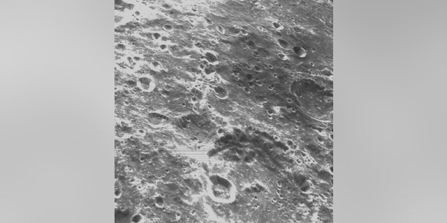 On the sixth day of the Artemis I mission, the Orion Optical Navigation Camera captured black and white images of craters on the lunar surface below.